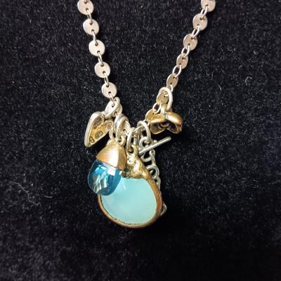 CHARM NECKLACE, GOLD TONE RING SIZE 5 AND A PAIR OF EARRINGS