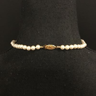 Beautiful, classic vintage, faux, pearl double knotted necklace, gold tone
