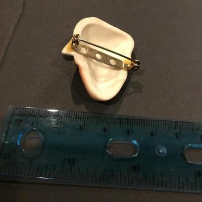 Vintage, porcelain, or ceramic ladies, head brooch pin