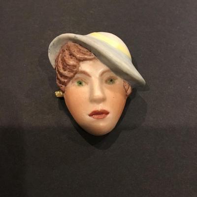 Vintage, porcelain, or ceramic ladies, head brooch pin