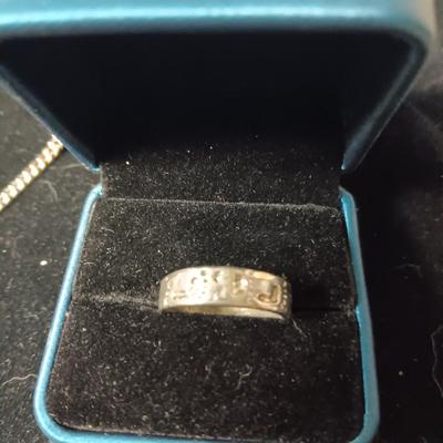 SILVER TONE NECKLACE AND PENDANT NECKLACES WITH BLACK STONES PLUS A SILVER TONE RING SIZE 8