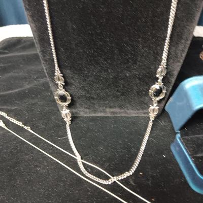 SILVER TONE NECKLACE AND PENDANT NECKLACES WITH BLACK STONES PLUS A SILVER TONE RING SIZE 8