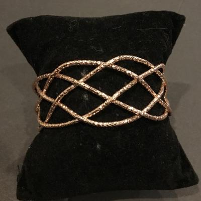 Pretty rose, gold toned cuff bracelet