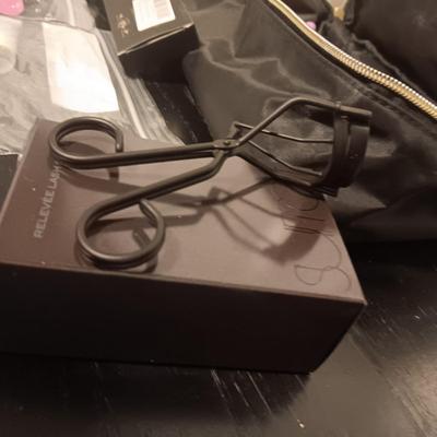 BEAUTY PRODUCTS AND A MAKEUP BAG