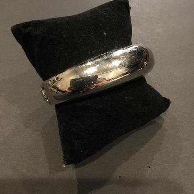 Heavy metal Silver-tone hinged bangle bracelet