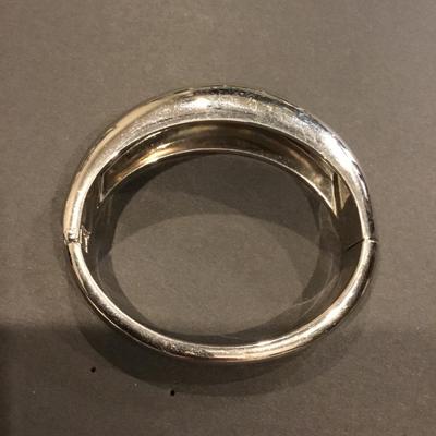 Heavy metal Silver-tone hinged bangle bracelet