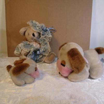 Stuffed musical dog with puppy, dressed stuffed bear