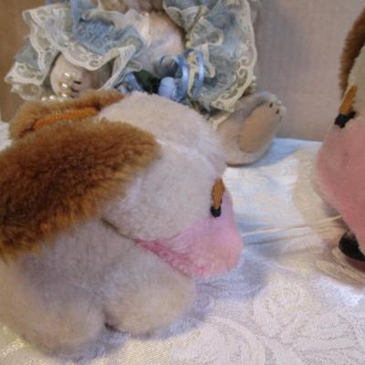 Stuffed musical dog with puppy, dressed stuffed bear