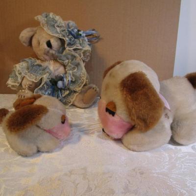 Stuffed musical dog with puppy, dressed stuffed bear