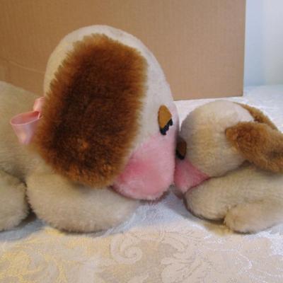 Stuffed musical dog with puppy, dressed stuffed bear