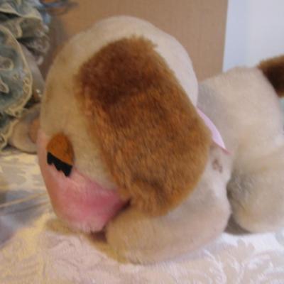 Stuffed musical dog with puppy, dressed stuffed bear