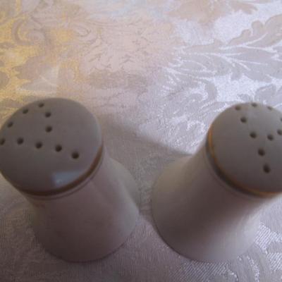 2 shot glasses, 1 set of salt & pepper shakers, 2 matching pepper shakers, 2 shells