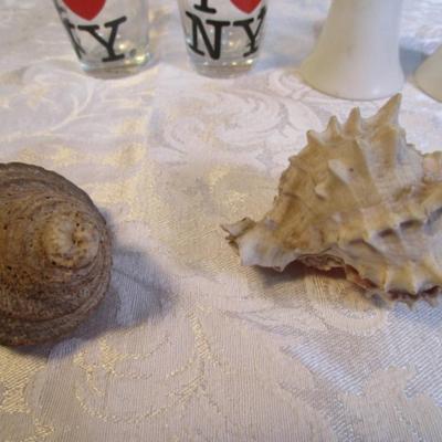 2 shot glasses, 1 set of salt & pepper shakers, 2 matching pepper shakers, 2 shells