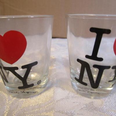 2 shot glasses, 1 set of salt & pepper shakers, 2 matching pepper shakers, 2 shells