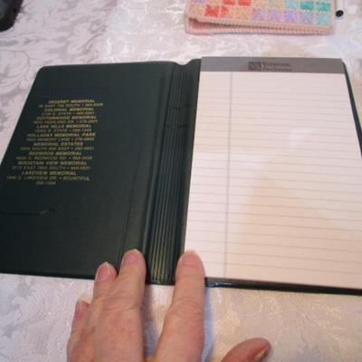 8 notepad holders with 5" x 7" notepads