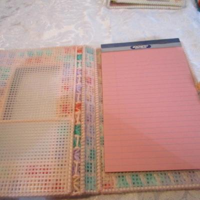 8 notepad holders with 5" x 7" notepads