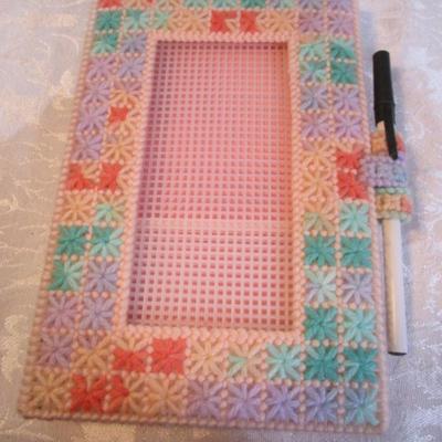 8 notepad holders with 5" x 7" notepads