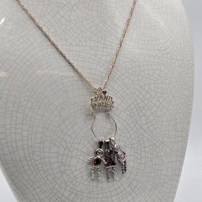 LOT 40: 18 inch Sterling Silver Chain with Grandmother and Grandchildren Charms 12.2gtw