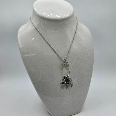LOT 40: 18 inch Sterling Silver Chain with Grandmother and Grandchildren Charms 12.2gtw