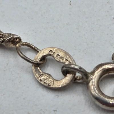 LOT 40: 18 inch Sterling Silver Chain with Grandmother and Grandchildren Charms 12.2gtw