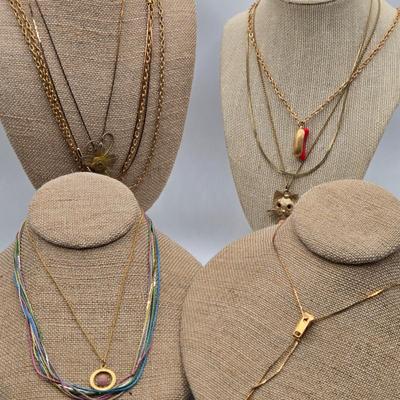 LOT 47: Variety of Gold-tone Necklaces