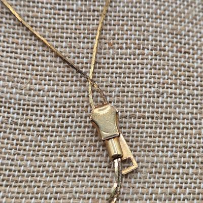 LOT 47: Variety of Gold-tone Necklaces