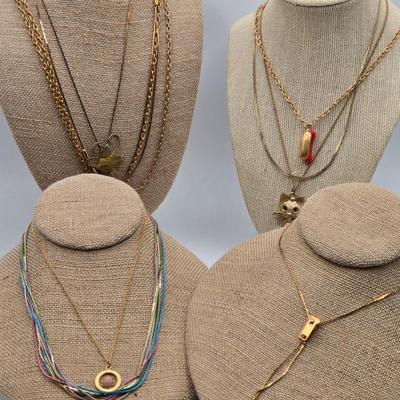 LOT 47: Variety of Gold-tone Necklaces