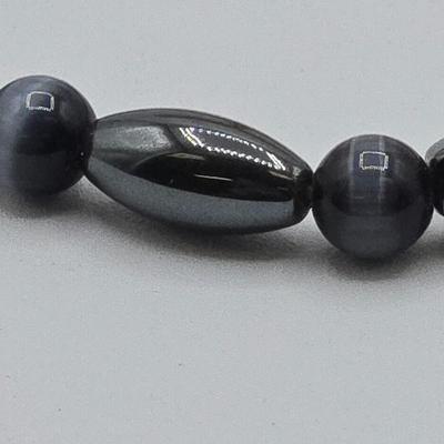 LOT 50: Variety of Bracelets, ten commandments charm bracelet & more