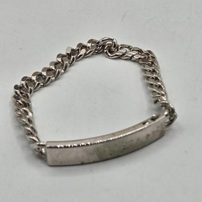 LOT 50: Variety of Bracelets, ten commandments charm bracelet & more