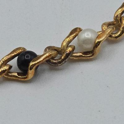 LOT 50: Variety of Bracelets, ten commandments charm bracelet & more