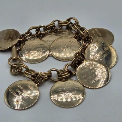 LOT 50: Variety of Bracelets, ten commandments charm bracelet & more