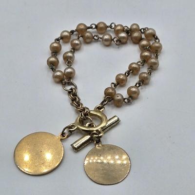 LOT 50: Variety of Bracelets, ten commandments charm bracelet & more