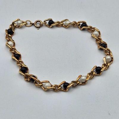 LOT 50: Variety of Bracelets, ten commandments charm bracelet & more