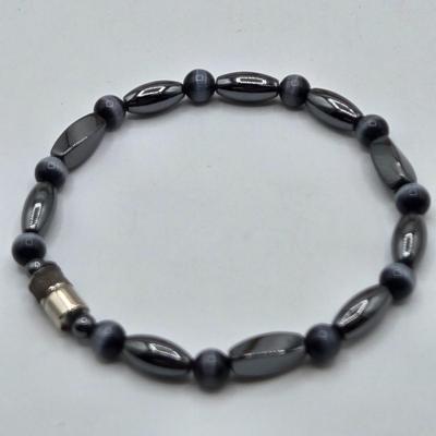 LOT 50: Variety of Bracelets, ten commandments charm bracelet & more