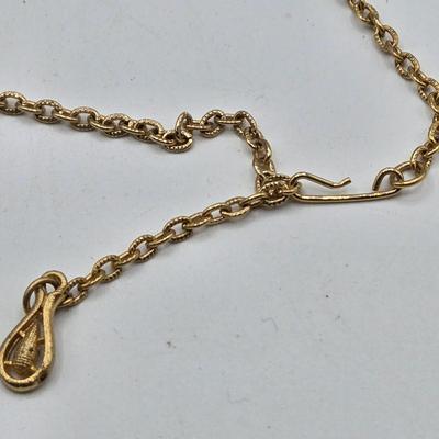 LOT 52: Four Necklace and Earrings Sets