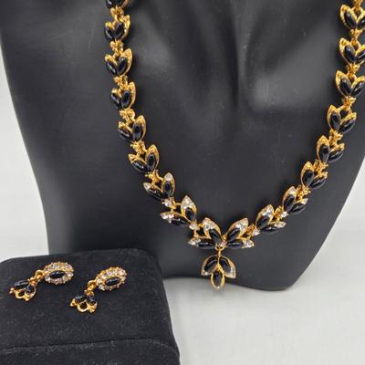 LOT 52: Four Necklace and Earrings Sets