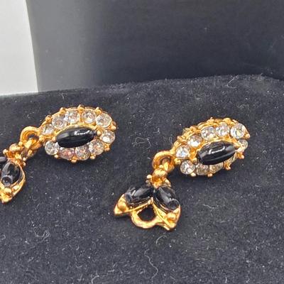 LOT 52: Four Necklace and Earrings Sets