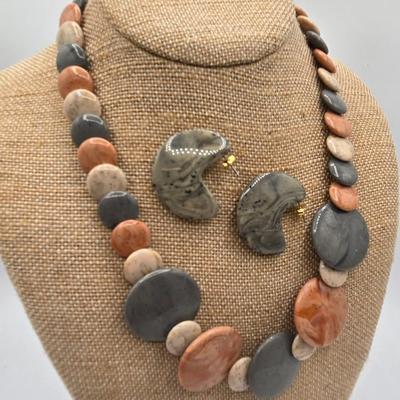 LOT 52: Four Necklace and Earrings Sets