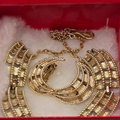 LOT 52: Four Necklace and Earrings Sets