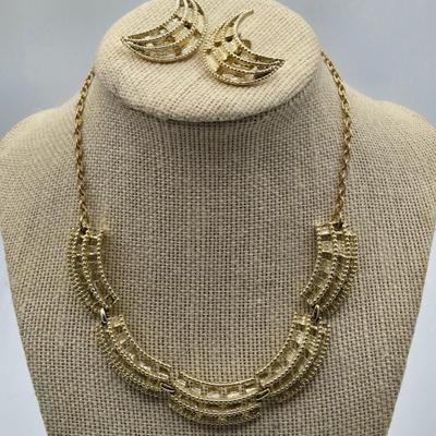 LOT 52: Four Necklace and Earrings Sets