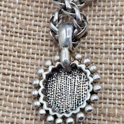 LOT 52: Four Necklace and Earrings Sets