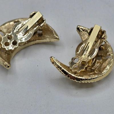 LOT 52: Four Necklace and Earrings Sets