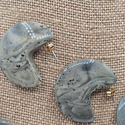 LOT 52: Four Necklace and Earrings Sets