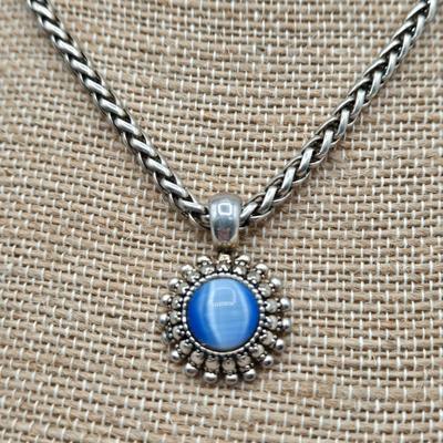 LOT 52: Four Necklace and Earrings Sets