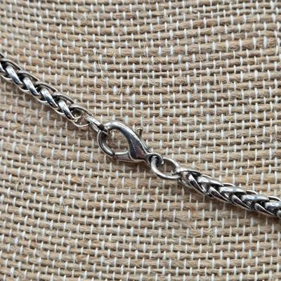 LOT 52: Four Necklace and Earrings Sets