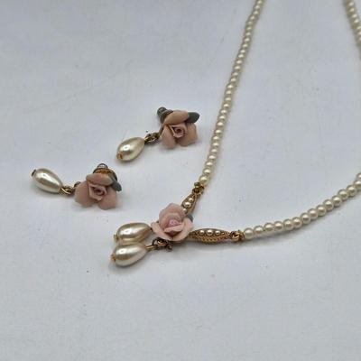 LOT 52: Four Necklace and Earrings Sets