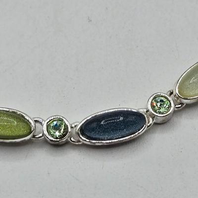 LOT 57: Assortment of Bracelets, Earrings, and Charms