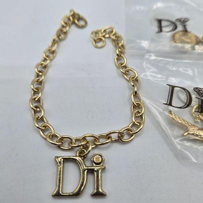 LOT 57: Assortment of Bracelets, Earrings, and Charms