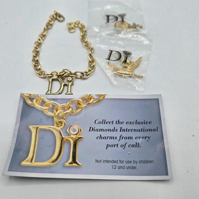 LOT 57: Assortment of Bracelets, Earrings, and Charms