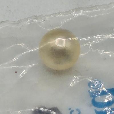 LOT 57: Assortment of Bracelets, Earrings, and Charms